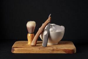 Classic Shaving Equipment With Razor, Brush, and Soap on Wooden Stand Against Dark Background photo