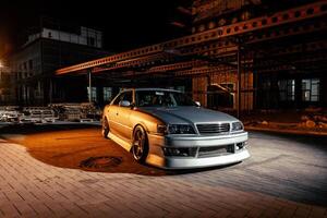 Silver Car Parked in Front of Building photo