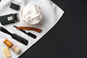 Traditional Wet Shaving Gear Arranged on a Dark Background With Morning Light photo