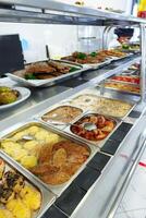 Variety of Food Displayed on Buffet Table photo
