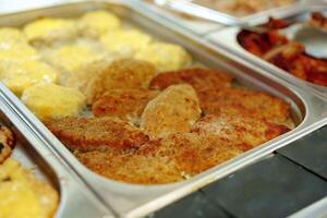 Variety of Food Displayed on Buffet Table photo
