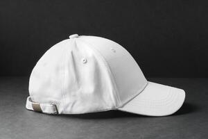 White Baseball Cap on Black Background photo