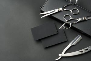 Tools for barbershop on black background studio shot photo