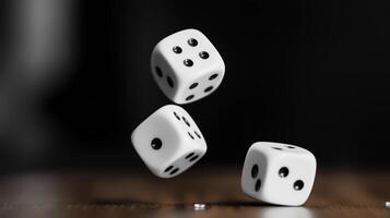 Three white dice rolling through the air above a wooden surface, captured in motion during a lively gaming session photo