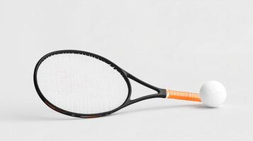 A tennis racket and ball resting on a light background, highlighting the sport's essential equipment and simplicity photo