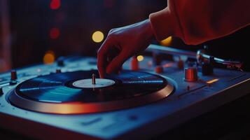 A DJ adjusts the turntable while mixing tracks at a vibrant night event filled with colorful lights and an energetic atmosphere photo