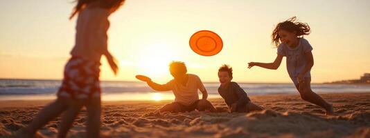 Children playing with a frisbee on the beach at sunset, enjoying a warm evening by the ocean photo