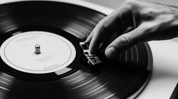 A person gently places a needle on a vinyl record in a home setting, capturing the essence of analog music enjoyment photo