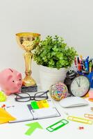 Work place of a creative person with a variety of colorful stationery objects photo