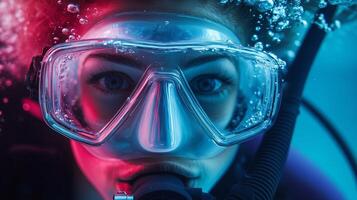 Diver exploring underwater environment with clear visibility and vibrant light effects during a daytime scuba diving adventure photo