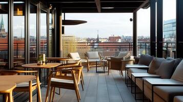 A stylish rooftop terrace in a modern urban setting overlooking the city skyline during a serene afternoon photo