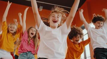 Happy children celebrating together in colorful shirts during a joyful indoor activity in a bright studio setting photo