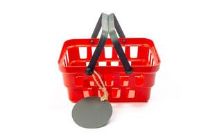 shopping cart with empty price tag isolated on white background photo