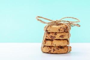 chocolate chunk cookies on a bright blue background photo
