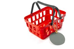 shopping cart with empty price tag isolated on white background photo