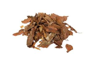 heap of pine bark isolated photo