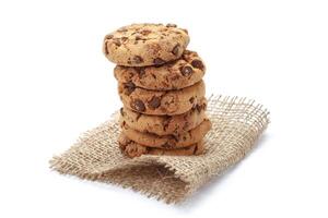 Chocolate chip cookie on white photo