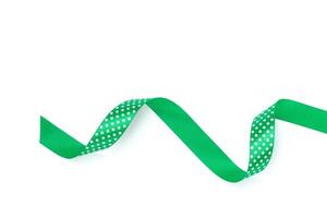 a green ribbon isolated on white background photo