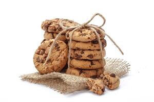 Chocolate chip cookie on white photo