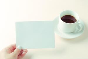 Blank card with coffee cup with space photo