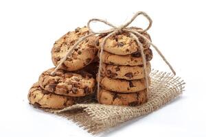 Chocolate chip cookie on white photo