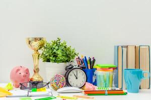 Work place of a creative person with a variety of colorful stationery objects photo