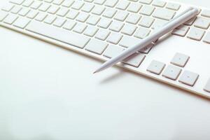 Close up image of computer office keyboard on a white background photo