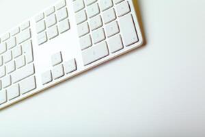 Close up image of computer office keyboard on a white background photo