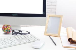 working table with computer photo