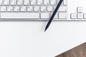 Close up image of computer office keyboard on a white background photo