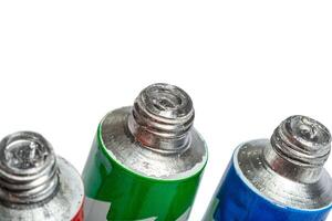 paint in tubes isolated on white photo