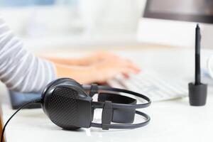Designer using graphic tablet at office photo