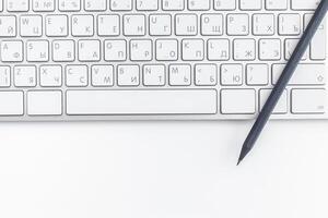 Close up image of computer office keyboard on a white background photo