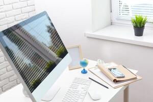 working table with computer photo