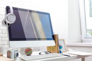 working table with computer photo