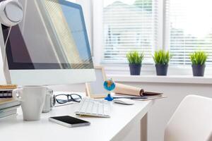 working table with computer photo