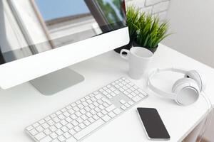 working table with computer photo