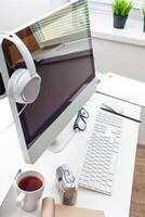 working table with computer photo