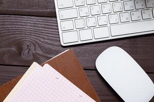 Working place on wooden table photo