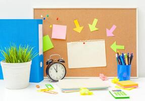Work place of a creative person with a variety of colorful stationery objects photo