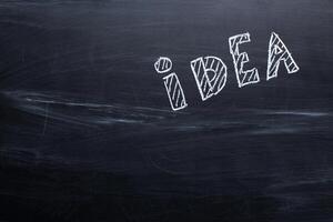 idea drawn with chalk on a blackboard photo