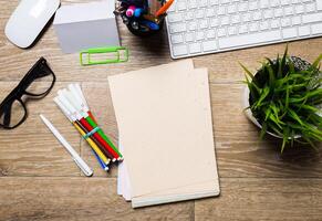 Working place on wooden table photo