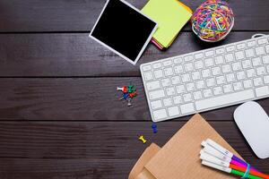 Working place on wooden table photo
