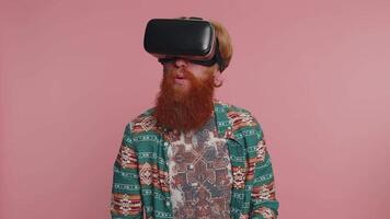 Man using virtual reality headset helmet app to play simulation innovation 3D game in VR goggles video