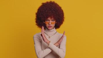 Angry girl say No hold palm folded crossed hands, warning of finish, Stop gesture, declining talk video