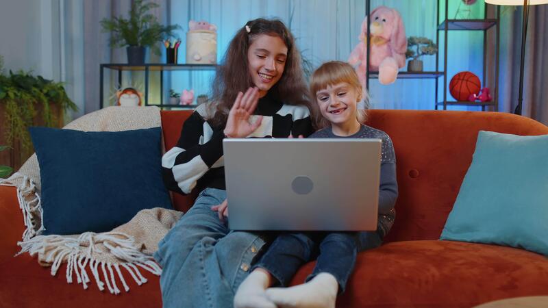 Sisters child kids using laptop, making webcam conference ...