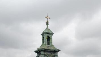 Aerial drone view footage of Latin Cathedral church dome in city Lviv Ukraine, cloudy sky background video