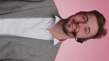 Business man wearing headset call center, support service operator helpline having talk with client video