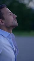 A Portrait of a Thoughtful Man Captured in a Beautiful Nature Setting, Embracing Serenity video