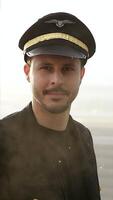 A Professional Pilot Dressed in Uniform Posing Against a Beautiful Scenic Background video